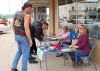 Linda Freeman & Ronda Zeltinger welcome drivers. Image